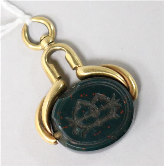 A Victorian gold and bloodstone spinning fob seal (a.f.).